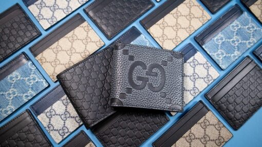 1 BOX OF ASSORTED AUTHENTICATED GUCCI WALLETS AND CARD HOLDERS